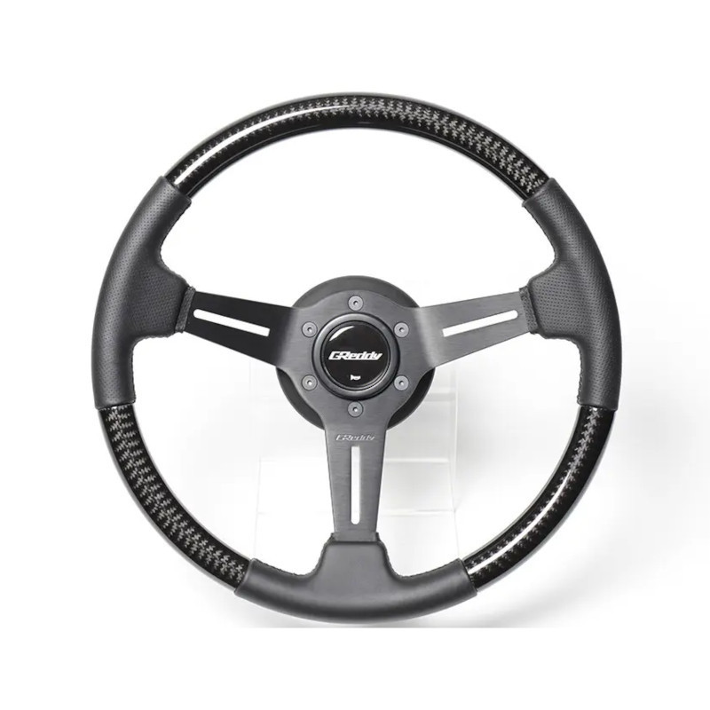 Volant GReddy "Real Carbon" Tulipé (47 mm)